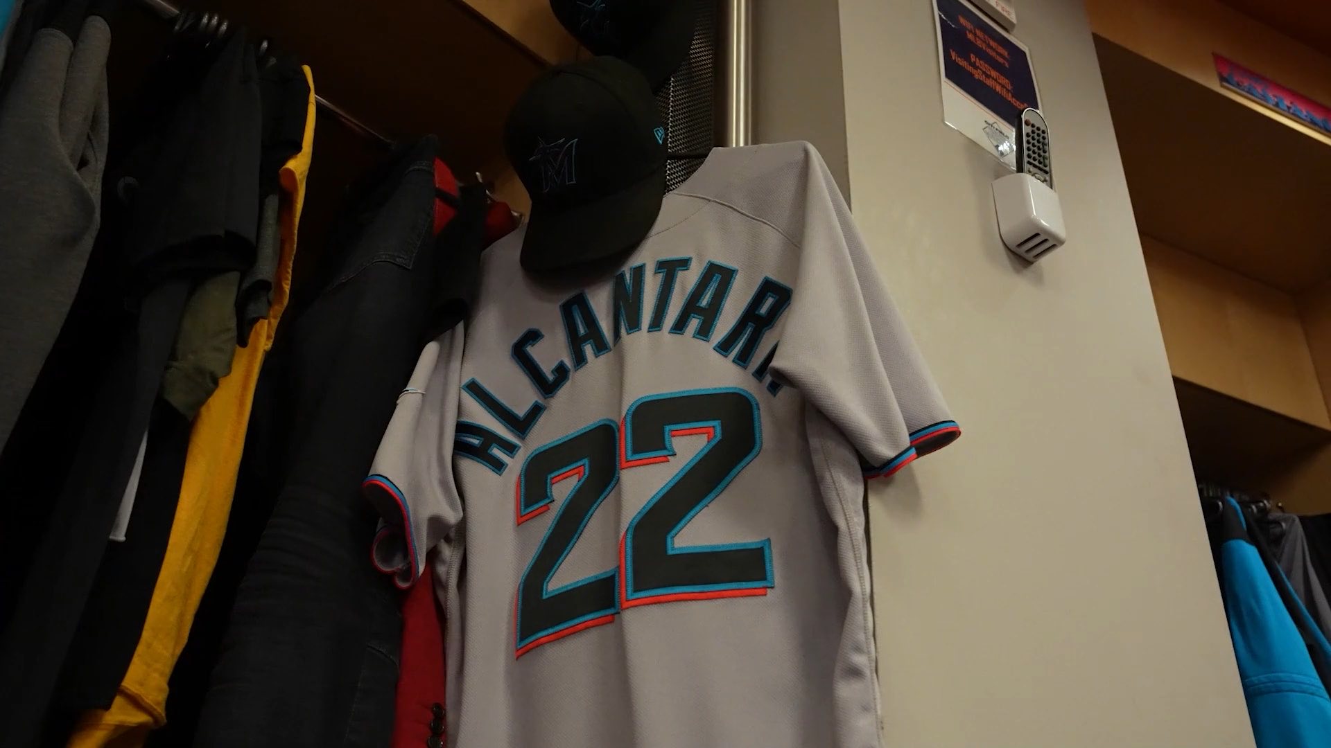 Sandy Alcantara's number 22 jersey hanging in the Marlins clubhouse, a still from the documentary 22